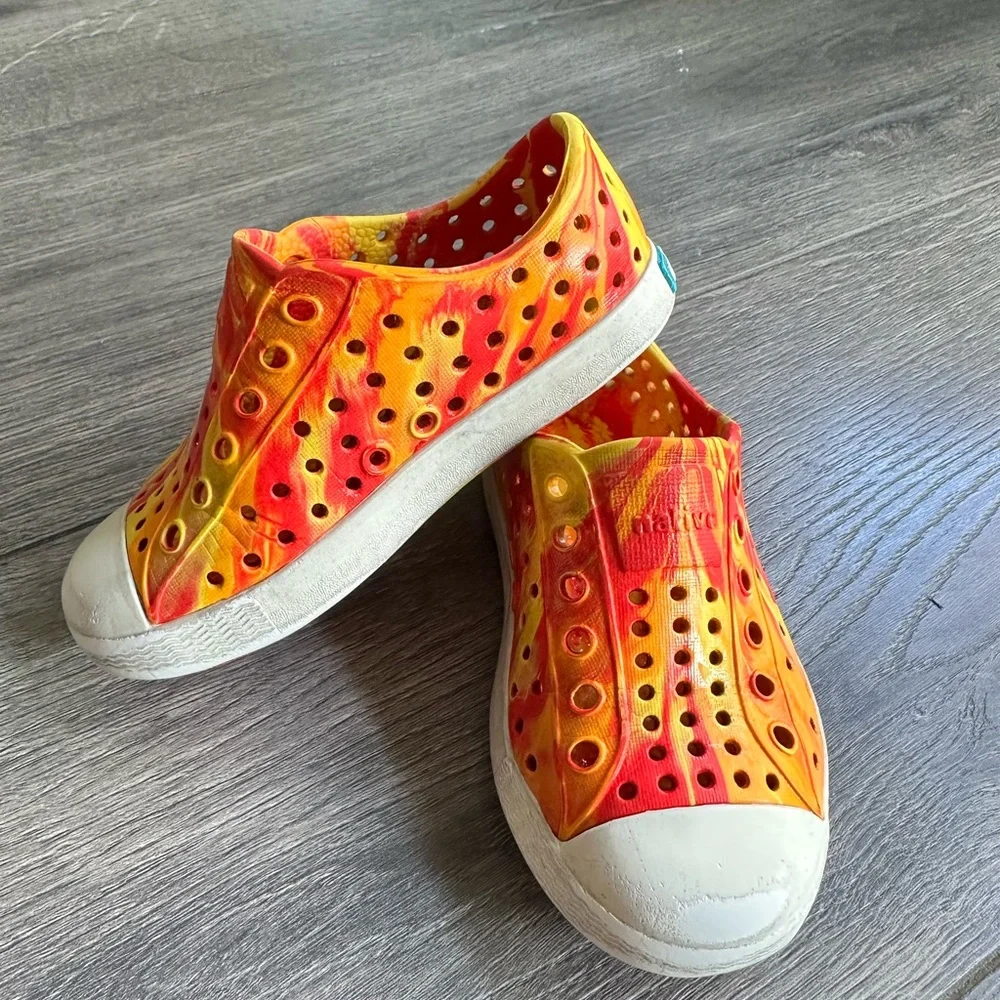 Unisex Native Shoes - yellow and orange tie-dye slip-on sneakers